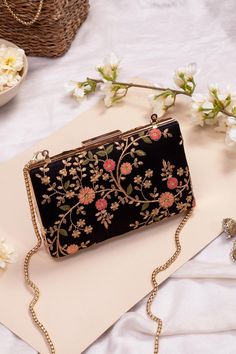 "Our Floral creeper clutches are super-hot, year-round! The traditional silhouette with exquisite floral embroidery and the metal chain sling are perfect to add that oomph to your overall look and make a strong style statement, no matter what the occasion. Embroidered front and back. Dimensions (LxB): 8\"x4.5\" (20 cm x 11 cm) Handle length: 47\" (120 cm) Handle drop: 23\" (58 cm) Material: Embroidered poly silk, poly satin lining, gold metal clutch frame, gold metal sling. Features: metal lock closure, detachable metal sling" Embroidered Clutch Bag, Personalized Clutch, Silk Clutch, Diy Clutch, Everyday Handbag, Embroidered Clutch, Party Clutch, Box Clutch, Wedding Bag