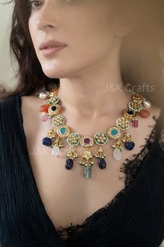 This necklace set features intricately-strewn kundan units, accented with a burst of multicolored natural stones for a vibrant touch. Paired with beautiful drop earrings, this set is a traditional addition to any jewelry collection. Expertly crafted with precision and attention to detail, this set is sure to add a touch of elegance to any outfit. Necklace Closure - Adjustable Dori, 169gm Earrings Closure - Push Back, 36gm (pair) Traditional Kundan Necklace With Multi-stones For Festivities, Traditional Festive Kundan Necklace With Multi-stones, Kundan Multi-stone Necklace For Wedding, Festive Dual-tone Kundan Bridal Necklace, Elegant Multicolor Dual-tone Kundan Necklace, Kundan Jewellery Bridal, Chic Necklace, Kundan Necklaces, Chic Jewelry