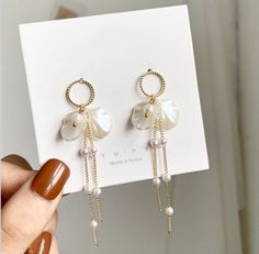 Check out our bow shaped pearl tassel earrings. Such an elegant pair of earrings, that would be perfect for just the right outfit. Elegant Pearl Drop Tassel Earrings, Elegant Pearl Drop Tassel Earrings For Party, Elegant Pearl Drop Dangle Tassel Earrings, Dangle Tassel Earrings With Pearl Drop For Gifts, Elegant White Tassel Earrings For Pierced Ears, Chic Tassel Earrings As A Gift, Vintage Earring, Long Tassel Earrings, Alloy Earrings