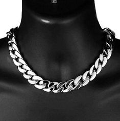 Men's 16" inch long x 18 mm wide Cuban link choker hip hop chain necklace. Plain silver tone over thick alloy metal core. Chunky cuban choker weighs a hefty 185 grams - has a premium feel. 16" inch choker is ideal for for a snug fit around neck. Chain has a plain smooth rhodium plated finish, for a dazzling shine. Stylish box clasp to lock your choker securely. Made in Korea for a solid quality chain necklace that is sure to please. 100% FREE SHIPPING in USA. Order now! Mens Choker, Cuban Link Choker, Cuban Choker, Choker Chain Necklace, Hip Hop Chains, Metal Core, Cuban Link Chain Necklaces, Choker Chain, Box Clasp