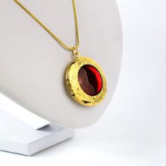 Beautiful resin locket necklace with bright colors. This locket is created using high-quality French resin and stain glass paints. The length of the pendant is about 1.25 inches (3.5 cm). The chain is brass with an anti-allergenic gold color coating. The length is 18 inches (46 cm). Worldwide shipping! ♥ Gift messages and gift packing Feel free to include a gift message and put it in the direct address of the receiver. We ship without a receipt and no unnecessary information will be spoiled. Add Personalized Red Jewelry For Birthday Gift, Handmade Red Jewelry For Birthday Gift, Red Locket Necklace For Jewelry Making, Red Locket Necklace With Round Pendant, Red Locket Jewelry For Valentine's Day, Red Jewelry For Valentine's Day Keepsake, Red Keepsake Pendant Necklace, Personalized Red Necklace For Gift, Red Locket Pendant Jewelry