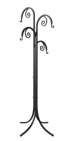 a black metal coat rack with two hooks on it's sides and an ornate design