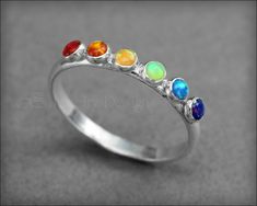 Multi Opal Ring - (choose # of opals) – LE Jewelry Designs Silver Opal Birthstone Jewelry, Adjustable Multi-stone Opal Ring For Anniversary, Spiritual Sterling Silver Multi-stone Rings, Adjustable Sterling Silver Multi-stone Rings, Adjustable Multi-stone Sterling Silver Rings, Spiritual Multi-stone Sterling Silver Rings, Multi-stone Sterling Silver Opal Ring, Rainbow Sterling Silver Promise Ring, Adjustable Silver Opal Promise Ring