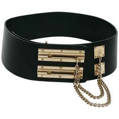 CHANEL black leather wide belt featuring two gold toned sliding chain locks. As seen on the CHANEL Spring/Summer Ready-To-Wear 2002 runway. Embossed CHANEL 02 P Made in Italy. Size 90/36. Indicative measurements : adjustable length from approx. 84 cm (33.07 inches) to approx. 94 cm (37 inches) / width approx. 7.8 cm (3.07 inches). BELT CONDITION CHART - New or never worn : item is in pristine condition with no noticeable imperfections - Excellent : item has been used and may have not more than t Black Belts With Gold-tone Hardware For Evening, Luxury Formal Chain Belt With Gold-tone Hardware, Luxury Black Chain Belt, Luxury Black Chain Belt For Evening, Chanel Chain Belt, Vintage Chanel Jewelry, Midi Black Dress, Black Leather Corset, Chanel Spring Summer