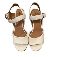 Visit The Lucky Brand Store 4.5 3,606 Lucky Brand Women's Mindra Espadrille Wedge Sandal, 7.5, Ivory, Never Worn Casual White Wedge Sandals With Heel Strap, Spring Cream Wedge Sandals With Block Heel, Cream Block Heel Wedge Sandals For Spring, Casual White Heels With Heel Loop, Cream Wedge Sandals With Heel Strap And Round Toe, Cream Wedge Sandals With Heel Strap And Block Heel, Cream Wedge Sandals With Block Heel And Heel Strap, White Synthetic Wedge Sandals With Stacked Heel, Cream Block Heel Wedge Sandals With Heel Strap