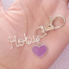 Do you love Hobi? This is the best bag charm or keychain for every BTS fan! Available in Stunning Silver with this beautiful purple heart! We bet you can't wait to get this and show all of your BTS-lover friends! We use NON-TARNISH silver plated copper wire - 16 gauge. Beautifully made and very sturdy. Made and shipped from the USA. Bts Ring, Bts Necklace, Bts Jewelry, Bts Keychain, Bts Gifts, Jhope Jimin Jungkook, Kpop Keychain, Kpop Jewelry, Bts Earrings