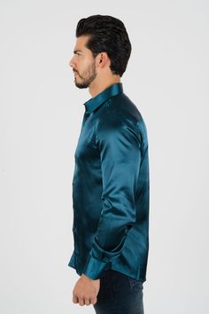 Fabric: Satin Fit: Relaxed fit About: This solid-colored satin dress shirt from Platini Jeans will enhance your fashionable wardrobe. The head-turning color adds flair to the classic long sleeve shirt. A relaxed fit delivers sleek style, and the point collar provides a modern finishing touch. Details & Features: Satin Point Collar Long sleeve Button closure Modern Fit Machine Washable Classic style Elegant Satin Shirt With Spread Collar, Sleek Long Sleeve Silk Shirt, Classic Satin Shirt With Spread Collar, Sleek Collared Satin Shirt, Sleek Satin Collared Shirt, Sleek Satin Shirt, Classic Satin Shirt For Business, Fitted Silk Shirt, Sleek Style, Classic Satin Business Shirt