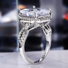 This Gorgeous Shiny Square Radiant Cut CZ Cocktail Ring is classified as Victorian Jewelry or as Romantic Jewelry, expressing demure personal style. The Square Radiant Cut Gemstone looks glistening to express your unique self. Silver Color is a versatile choice, that withstands the test of time. You can wear this Gorgeous Shiny Square Radiant Cut CZ Cocktail Ring on its own or partner with classic silhouettes for an expressing demure personal style pairing. TJ(trendyjewelrys.com) is your premier Fashion Oversized, Romantic Jewelry, Romantic Jewellery, Detailed Ring, Diamond Simulant, Silver Wedding Rings, Jewelry Rings Diamond, Radiant Cut, Victorian Jewelry