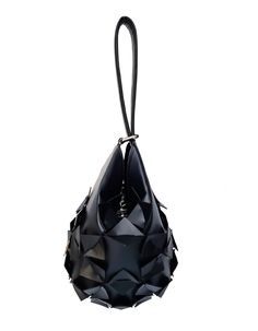 Accessories can make or break an outfit and none speak louder than a bold statement bag. Due to its timeless shape, this bucket bag can be worn effortlessly throughout the year. Carry it on the wrist or hold it for a contemporary take on evening dressing. Our Star Bucket bag is like a precious ornament that will add a luxury and edgy touch to your every look. She's crafted from quality vegan leather to a water-drop silhouette. It's signature three-dimensional geometric surface is punctuated by s Evening Bucket Bag With Detachable Handle, Modern Evening Bucket Bag With Removable Pouch, Party Bucket Bag With Detachable Shoulder Strap, Elegant Party Bucket Bag With Adjustable Strap, Handheld Black Bucket Bag, Black Bags With Detachable Handle For Fashion, Modern Pouch Evening Bag For Shopping, Modern Evening Pouch Bag For Shopping, Modern Bag With Adjustable Strap For Party