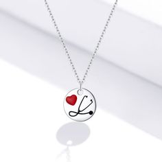 Adorable Sterling Silver Angel in White Nurse Chain Necklace for Women Chain Length: up to 17.7" | 45 cm ( Adjustable ) Pendant Diameter: 0.47" | 12 mm Material: Sterling Silver FAST Shipping from FL, USA Heart-shaped Surgical Steel Jewelry For Gifts, Silver Heart Necklace With Adjustable Chain, Adjustable Hypoallergenic Heart Pendant Necklace, Silver Surgical Steel Heart Jewelry, Silver Heart-shaped Surgical Steel Jewelry, Nickel-free Necklaces For Valentine's Day, Hypoallergenic Round Jewelry For Valentine's Day, Hypoallergenic Jewelry For Valentine's Day, Heart-shaped Surgical Steel Jewelry As Gift