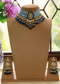 Kundan choker necklace with matching earrings Perfect for any kind of occasions and ceremonies. You can wear it with Saree lehenga and Evening Gowns. Highest quality and craftsmanship. Arrives in box Please let me know if you have any questions Blue Meenakari Bridal Necklace For Wedding, Blue Kundan Necklace For Reception Festivities, Blue Kundan Necklace For Festive Reception, Blue Kundan Necklace For Reception And Festive Occasions, Blue Bollywood Bridal Necklace For Wedding, Blue Chandbali Kundan Necklace For Wedding, Blue Kundan Necklaces For Reception, Blue Kundan Necklace For Reception, Blue Kundan Necklace For Diwali Wedding