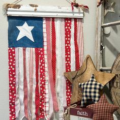 an american flag is hanging on the wall next to other patriotic decorations and decor items