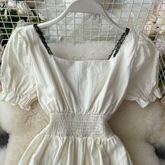 Sweet A line short dress fashion dress Material: blended Color: white Size(cm): S, M, L S length 108 bust 100 waist 56-94 M length 109 bust 104 waist 60-98 L length 110 bust 108 waist 64-102 Elegant White Mini Dress With Short Sleeves, White Fit And Flare Midi Dress In Mini Length, White Feminine Mini Dress, Feminine White A-line Dress, Elegant White Mini Dress For Summer, White Square Neck Dress For Summer, Elegant Summer Mini Dress With Square Neck, White A-line Feminine Dress, White Square Neck Midi Dress For Summer