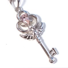 Stella is the celestial key that will not only unlock the magical realm of fairies, mermaids and spirits, but also will open the door to your heart. This Stella comes in Sterling Silver .925 plated in yellow, rose or white. Two dazzling stones, one light pink and one white, add sparkle to the pendant. She comes with a complimentary chain. Please note that this is plated jewelry and with proper care, it might need to be re-plated after 1-2 years. Orders will take 1 - 2 weeks to package + shipping Silver Key Necklace, Ethereal Jewelry, Anime Magic, The Cardigans, Shop Rings, Silver Key, Magical Jewelry, Open The Door, Key Necklace