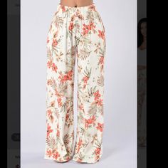 Nwt Soft Lightweight Beach Style Pants. Tropical Floral Print. High Waisted With A Stretchy Elastic Waist Band. Pockets!! Wide Legged. Size Up 1 Size, Only Selling Because They Don’t Fit. Great For 5’5” And Under. I Am Happy To Answer Questions I Do A Bundle Deal I Respond To All Offers Bohemian White Floral Print Pants, White Floral Print Pants For Summer, White Floral Print Summer Pants, White Cotton Pants For Beach Season, White Bohemian Pants For Beach Season, White Bohemian Pants For Vacation, White Floral Print Trousers, White Beach Pants With Elastic Waistband, White High Waist Bottoms With Floral Print