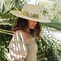 With a wider brim this beautiful fedora straw hat is the perfect summer addition to your beach and party look! Silk and cotton ribbons with small details around crown Sweatband with 'Sunsets & palm trees' inspirational quote All hats are unique and have perfect imperfections! Straw hat hand woven in Ecuador Hand made and designed by Valeria in California Spring Coastal Boater Hat Made Of Toquilla Straw, Summer Straw Hat With Upf 50+ For Garden Party, Spring Coastal Boater Hat With Flat Brim, Spring Coastal Straw Hat With Short Brim, Natural Fedora Panama Hat For Garden Party, Wide Brim Toquilla Straw Panama Hat For Garden Party, Flat Brim Panama Hat For Garden Party, Bohemian Panama Hat For Summer Garden Party, Toquilla Straw Wide Brim Panama Hat For Garden Party