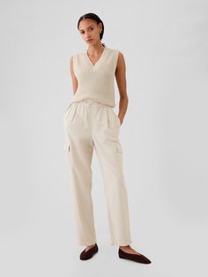 Supersoft cotton-Tencel™ blend pull-on pants.  Elasticized waist with drawcords.  Front slant pockets.  Side cargo pockets.  Tapered leg.  * Fit: Slim.  A semi-fitted silhouette that fits close to the body at the waist and hip, with a slight ease through the thigh.  Tapered leg.  Model is approx.  5’10” wearing Leg Model, Fitted Silhouette, Inspiration Style, Pull On Pants, Chinos Pants, Tapered Legs, Cargo Pants, Clothing Accessories, Gap