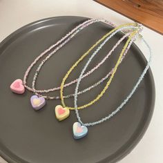 Material: Imitation pearl Color: Blue, Yellow, Purple, Pink Fashion Element: Love Heart/Heart Shape Style: Korean Korean Style Party Necklaces With Heart And Round Beads, Heart Beaded Necklaces For Parties, Trendy Party Beaded Necklace With Heart Beads, Sweet Heart Beads Necklace For Gift, Sweet Beaded Necklaces For Gifts, Sweet Necklace With Heart Beads For Gifts, Sweet Heart Beads Jewelry For Gift, Sweet Heart Beads Jewelry For Valentine's Day, Party Heart Shaped Beaded Necklace