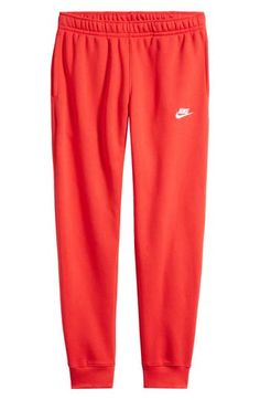 An embroidered Swoosh marks the pocket of these sweatpants made for comfort from fleece with a sporty fit that slims at the ankle. 28 1/2" inseam; 10" leg opening; 12 1/2" front rise; 16 1/2" back rise (size Medium) Elastic/drawstring waist Side-seam pockets; back welt pocket Cotton/polyester Machine wash, tumble dry Imported Fleece Joggers, Nike Sportswear, Welt Pocket, Drawstring Waist, Red White, Sweatpants, University, Nordstrom, Size Large