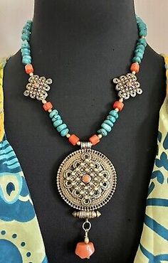 Golden bronze enameled Tibetan Nepalese Ghau With Turquoise And Coral Necklace.  | eBay Antique Jewelry Necklace, Turquoise And Coral, The Coral, Coral Necklace, Coral Beads, Both Sides, Handmade Necklaces, Antique Jewelry, Vintage Antiques