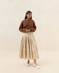 Chic Tiered Skirt For Fall, Chic Ruffled Fall Skirt, Chic Fall Ruffled Skirt, Chic Tiered Skirt, Chic Relaxed Pleated Tiered Skirt, Chic Relaxed Tiered Pleated Skirt, Chic Tiered Pleated Relaxed Skirt, Chic Pleated Lined Tiered Skirt, Chic Pleated Tiered Lined Skirt