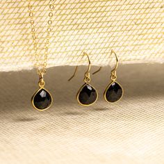 "Black Onyx Necklace and Drop Earrings Matching Set - Delicate, Dainty, minimalist, simple gold jewelry gift for wife, girlfriend, daughter This listing is for a SET and includes both a pair of earrings and necklace. Gemstones: Genuine Black Onyx Bezel: Vermeil Gold (14k Gold over Sterling Silver) Note that due to the handmade nature of these genuine stones, measurements/color are approximately and might vary slightly for each stone. Necklace: Drop Gemstone: 11mm x 9mm Gold chain: 14k gold fille Simple Drop Earrings Jewelry As A Gift, Simple Drop Earrings As A Gift, Simple Design Drop Earrings As A Gift, Simple Design Drop Earrings Jewelry For Gifts, Simple Teardrop Jewelry As Gift, Simple Teardrop Jewelry Gift, Simple Jewelry With Matching Earrings For Anniversary, Simple Jewelry Matching Earrings For Anniversary, Simple Anniversary Jewelry Set With Earrings