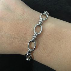 This jaw-dropping, 1/2 inch wide stainless steel bracelet is a show-stopper! Perfect for wearing solo or as part of a layered look. Measuring 7.5 inches long, this accessory is comfy for women's wrists 6.5 inches and under - but if you need a larger size, just reach out! Plus, stainless steel ups the ante with extra durability and a gleam that'll never tarnish! Metal Oval Link Bracelet With Strap Detail, Metal Oval Link Bracelet Strap Jewelry, Adjustable Oval Metal Bracelets, Hypoallergenic Metal Chain Link Bracelet, Adjustable Oval Link Stainless Steel Chain Bracelet, Adjustable Metal Chain Bracelet With Oval Link, Adjustable Metal Oval Link Chain Bracelet, Hypoallergenic Oval Link Metal Bracelets, Hypoallergenic Metal Oval Link Bracelets