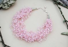 Sakura pink neklace, Air crochet necklace, Bridal choker, Pink wedding jewelry, Romantic necklace, Bridal shower jewelry gift for women. Pink flexible necklace with light glass beads and glass seed beads. A romantic, beautiful and flexible piece of jewelry, it will be a great addition to an evening or a wedding gown. This necklace are not so logn and you can use it like multistrand flexible choker. It might be a perfect gift for her in birthday, anniversary or another occasion. Measure: length ( Romantic Necklace, Bridal Choker, Multi Strand Necklace, Perfect Gift For Her, Multi Strand, Pink Wedding, Wedding Jewelry, Crochet Necklace, Jewelry Gifts