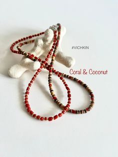 Beautiful coral and coconut natural  necklaces, made with 3-4m beads with a touch of the silver quality Czech glass seed beads. Get for yourself or gift to a friend. ♥   #vichkin #vichkindesign ↠ ABOUT    ▢  Size: about 15 inch, goes up to about 17 inch with chain extension.  ▢  Materials: 2mm quality Czech glass seed beads and 3-4mm coral beads and 4mm coconut beads.  ▢  This item is handmade and may vary slightly from the picture, making every one completely unique.  ▢  Ready to ship.  ↠ IMPOR Beaded Chocker, Coral Beads Necklace, Nature Necklace, Necklace Red, Summer Necklace, Necklace Beaded, Layering Necklace, Coral Beads, Glass Seed Beads