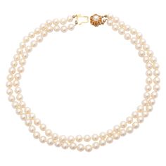 A vintage cultured pearl necklace set with a 14 karat gold clasp. The two-strand necklace is strung with cultured pearls and fastened to a beautiful 14 karat gold clasp. The clasp has a pearl set in the center, while the gold is designed with sloping notches. The pearl necklace is versatile and can be worn for a wedding, anniversary or any other occasion. The necklace is in beautiful condition. Marked, tested as 14k gold. Measurements: Length 42 cm Weight: 59 grams The necklace will be gift-wrapped in a black and gold Heztia presentation box. If you have any questions about this piece or if we can help you with any of our other items, please feel free to contact us. Beaded Pearl Necklace, Multi Strand Beaded Necklace, Pearl Strands Necklace, Pearl Necklace Set, Cultured Pearl Necklace, Pearl Set, Pearl Strands, Akoya Pearls, Freshwater Cultured Pearls