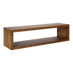 a wooden shelf sitting on top of a white wall in front of a white background