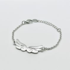 My Angel Baby Bracelet from New Born to Teen  Customize this charm bracelet with your one-of-a-kind engraving request. You can engrave a message of love to your baby on the front and the sender on the back! Each bracelet is handmade to order and a thoughtful gift for all occasions. This bracelet is the perfect gift. Each bracelet is one-of-a-kind and sentimental, making it a suitable gift for all kinds of occasions from Christmas, thanksgiving, anniversaries, to birthdays and more. Specification Personalized Sterling Silver Name Bracelet, Engraved Name Bracelet For Personalized Gift, Customizable Sterling Silver Name Bracelet, Personalized White Gold Bracelet, Customizable Stainless Steel Jewelry For Personalized Gifts, Personalized Meaningful Jewelry Bracelet, Meaningful Personalized Bracelet Jewelry, Engraved Sterling Silver Name Bracelet For Gift, Customizable Sterling Silver Charm Bracelet Gift