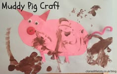 a child's artwork made to look like a pink pig with brown spots on it