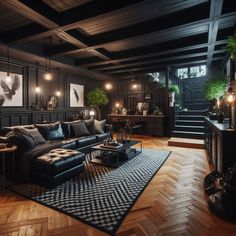 a living room filled with lots of furniture next to a stair leading up to a loft