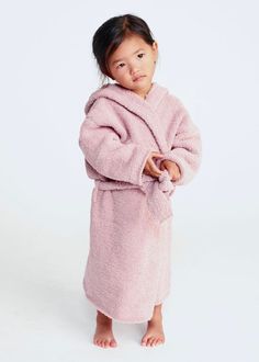 Wrap your child in the luxurious comfort of the Fuzzy Robe! Crafted from 100% recycled materials, this robe features a plush, fuzzy fabric that is perfect for lounging at home. With a sewn in waist tie for added convenience, it’s an eco-friendly way to keep your little one warm and cozy after bath time or during lazy days at home. Machine washable & dryable. No pilling! DETAILS Wrap tie Long sleeves Hood Oversized fit Sewn waist tie Soft and elasticized fabric for the utmost comfort Ultra-soft p Fuzzy Robe, Dad Diaper Bag, Fuzzy Fabric, After Bath, Tote Organization, Kids Scooter, Rain Pants, Sweater Jumpsuit, Satchel Tote