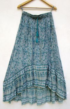 "ITEM DESCRIPTION Classic teal green printed cotton long maxi skirts | picnic wear summer indian long maxi skirts | with elastic waist Material: 100% cotton soft crinkled fabric Length: - 38 inch long Waist :-28.00 inch full (14 inch half) 28 inch relaxed can stretch up to 50 inch Size: free size (fit to all) PRODUCT NAME: - Long Women Maxi skirts Ladies Vintage Long skirts Company Return Policy: Please write for more information to my email directly CHOOSE \"ASK SELLER QUESTION \" payment polic Bohemian Ankle-length Cotton Skirt, Green Bohemian Maxi Skirt For Festival, Bohemian Green Maxi Skirt For Festivals, Green Maxi Skirt For Vacation, Green Hippie Maxi Skirt For Festival, Green Flowy Tiered Skirt Maxi Dress, Green Flowy Cotton Maxi Skirt, Green Cotton Maxi Skirt For Vacation, Green Bohemian Maxi Skirt With Boho Print