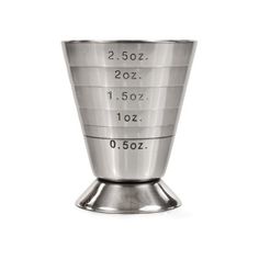 a metal measuring cup with numbers on it