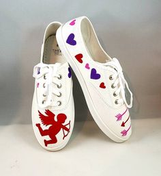 These are hand painted shoes for your Valentine. They are painted with high quality fabric paints, and sealed to protect the art. Painted on tie up white canvas shoes.TODDLER SIZESUS 7-11CHILD SIZESUS 12-6WOMENS SIZESUS 7-11 Hand Painted Canvas Shoes With Round Toe, Hand-painted Canvas Shoes With Round Toe, Hand Painted Round Toe Canvas Shoes, Hand Painted White Canvas Sneakers, Valentines Shoes, Painted Valentines, White Canvas Shoes, Girls Shoes Sneakers, Christmas Shoes