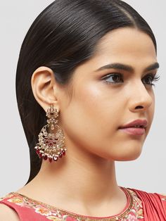 NAZRANAA JEWELS OFFERS A GREAT RANGE OF INDIAN JEWELRY FOR TODAY'S WOMAN WITH THE LATEST DESIGNS. THE BRAND IS COMMITTED TO PROVIDING ITS CUSTOMERS WITH THE HIGHEST QUALITY OF GOODS AND NEWEST DESIGNS. IT IS SUITED FOR A WOMAN WHO IS LOOKING TO STAY DATED WITH THE LATEST TRENDS. RADIANT ANTIQUE GOLD EARRINGS IN DIFFERENT COLOR PEARLS IS A PERFECT ACCESSORY FOR ANY NIGHT EVENT. IT IS SURE TO MAKE YOU STAND OUT IN A CROWDED ROOM. Traditional Indian Jewelry: Slight Color variations possible due to Festive Single Earring, Elegant Red Hoop Earrings With Latkans, Red Drop Earrings Danglers For Wedding, Red Drop Danglers For Wedding, Gold Kundan Earrings For Pierced Ears, Gold Chandbali Earrings With Jewels, Formal Red Kundan Earrings, Gold Single Earring Danglers For Wedding, Pierced Drop Bridal Earrings For Festive Occasions