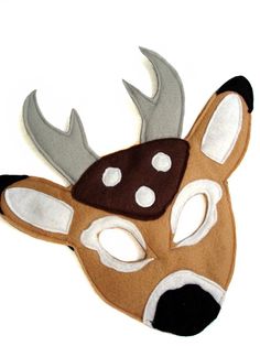 a deer mask with antlers on it