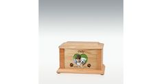 a wooden box with an image of a dog on the front and paw prints on the inside