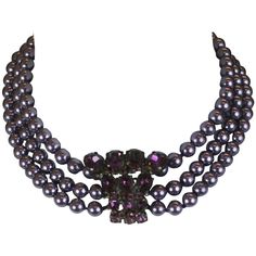 Elegant French Pearl Collar choker with 3 rows of purple faux pearls with central jeweled station and clasp. 1950's France. Shortest length (highest strand), 13.5", Width 1.75". Excellent condition. Jewel Choker, Necklaces Black, Retro Necklace, Necklaces Beaded, Pearl Collar, Pearl Strands Necklace, Collar Choker, Necklace Ideas, Necklace Pearl