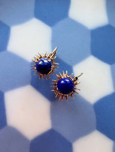 "For sale a beautiful pair of 14k gold earrings featuring two Lapis Lazulis cabochons. We love the earrings for its deep celestial blue color together with the golden glimmer from the yellow gold mounting. The earrings are hallmarked for 14K gold and they have the lever-back closing system for pierced ears. With its deep celestial blue, lapis lazuli has been used as a charm to ward off the powers of darkness. Its name is derived from the Latin for \"blue stone\"--has long been treasured as a gem material as well as for its other uses. Ancient Egyptians ground it into a powder for use in cosmetics. Medieval builders used it in mosaics to adorn their cathedrals. Renaissance painters coveted lapis as an ingredient for making \"ultramarine\" blue, an expensive pigment of unrivalled brightness Yellow Gold Cabochon Drop Earrings, 14k Gold Huggie Earrings Gift, Gold Cabochon Earrings For Anniversary, Yellow Gold Cabochon Earrings For Anniversary, Fine Jewelry 14k Gold Hoop Earrings For Gift, 14k Gold Drop Earrings Gift, Fine Jewelry 14k Gold Hoop Earrings As A Gift, Gift 14k Gold Fine Jewelry Hoop Earrings, Luxury Gemstone Clip-on Earrings For Gift