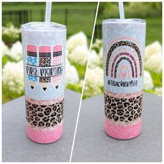 two tumblers with different designs on them sitting next to each other