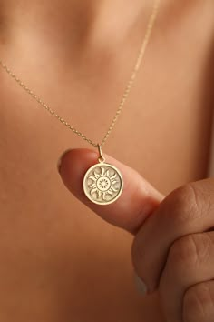 Gold Sun Pendant - Sun Gold Necklace ● Material of pendant: Solid Gold 14k ( REAL GOLD ) ● Metal Stamp: 14k ( REAL GOLD ) ● The pendant is available in 5 sizes: - 12,7 mm / 0.5 inches (Diameter) - 14,0 mm / 0,55 inches ( Diameter ) In the photos - 15,3 mm / 0.6 inches ( Diameter ) - 16,5 mm / 0,65 inches ( Diameter ) - 19,1 mm / 0,75 inches ( Diameter ) ( In the photos the size is 14mm / 0.55 inches Diameter ) ( Jump Ring inner diameter: 4 mm ) ● Material of chain: Solid gold 14k ( REAL GOLD ) I 14k Gold Spiritual Round Pendant Jewelry, Spiritual 14k Gold Filled Yellow Gold Charm Necklaces, Spiritual 14k Gold Round Pendant Jewelry, Spiritual 14k Gold Round Pendant, 14k Gold Filled Yellow Gold Pendant, 14k Yellow Gold Filled Pendant Jewelry, 14k Gold Round Pendant Necklace Gift, Spiritual 14k Gold Jewelry Stamped 14k, Handmade Yellow Gold Charm Necklace With Round Pendant