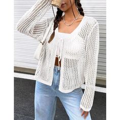 Introducing our Women's Lightweight Crochet Cardigan, the perfect combination of style, comfort, and versatility. This Tie Front Shrugs Knit Cardigan is designed to elevate your wardrobe with its chic and feminine look. The long sleeves and mesh design make it an ideal choice for layering over your outfits as a stylish cover-up during the summer months. Crafted from a blend of 89% Viscose and 11% Nylon, our women's cardigan is lightweight, soft, and breathable, providing a comfortable and flatte Casual Long Sleeve Crochet Top For Day Out, Casual Open Knit Sweater For Vacation, Casual Crochet Top For Fall Day Out, Fall Crochet Open Knit Top For Vacation, Casual Long Sleeve Crochet Top For Layering, Fall Vacation Open Knit Crochet Top, Casual Open Front Beach Cardigan, Casual Open Front Cardigan For Beach Season, Casual Open Front Cardigan For The Beach