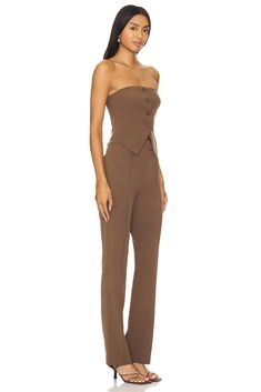 Self: 95% polyester 5% spandex, Lining: 100% polyester.  Made in China.  Hand wash.  Zip fly with button closure.  Front button detail.  Midweight suiting fabric.  Sold as a set.  Neckline to hem measures approx 57" in length, 18" at the knee narrows to 15" at the leg opening.  .  .  .  .  .  .  .  . Fitted Sets With Buttons For Workwear, Fitted Buttoned Sets For Workwear, Fitted Workwear Sets With Buttons, Fitted Pantsuit With Double Button Closure For Office, Fitted Sets With Double Button Closure For Workwear, Fitted Buttoned Sets For Business Casual, Fitted Office Pantsuit With Double Button Closure, Fitted Office Sets With Buttons, Fitted Business Casual Sets With Buttons