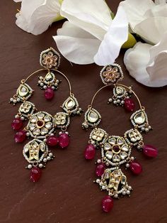 This pair of earrings has its own quirky charm. These earrings come as a perfect accessory to elevate your look from drab to delightful. One word that perfectly describes these earrings is royal. These earrings get their sophisticated look from the intricate design-work done on them. Each pattern is flawless and is the result of the meticulous attention to details craftsmen. 100% Satisfaction Guarantee: Long Lasting Plating, High-Quality Stones, Highest quality and craftsmanship. Gifting: This p Single Chandbali Earring For Festive Occasions, Festive Chandbali Single Earring, Diamond Earrings Wedding, Earring Indian, Sabyasachi Jewelry, Pakistani Earrings, Sabyasachi Jewellery, Traditional Earrings, Kundan Earrings