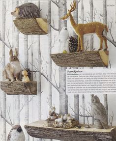 an image of birds and animals on display in the woods with deers, owls, pine cones