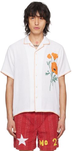 Handcrafted mock leno-woven cotton shirt. Whipstitching throughout. · Open spread collar · Button closure · Floral graphic embroidered at front Supplier color: Off white Summer Embroidered Button-up Camp Shirt, Embroidered Button-up Camp Shirt For Summer, Spring Embroidered White Camp Shirt, White Embroidered Camp Shirt For Spring, White Embroidered Summer Camp Shirt, White Embroidered Camp Shirt For Summer, White Camp Collar Top With Floral Embroidery, White Embroidered Cotton Camp Shirt, White Cotton Embroidered Camp Shirt